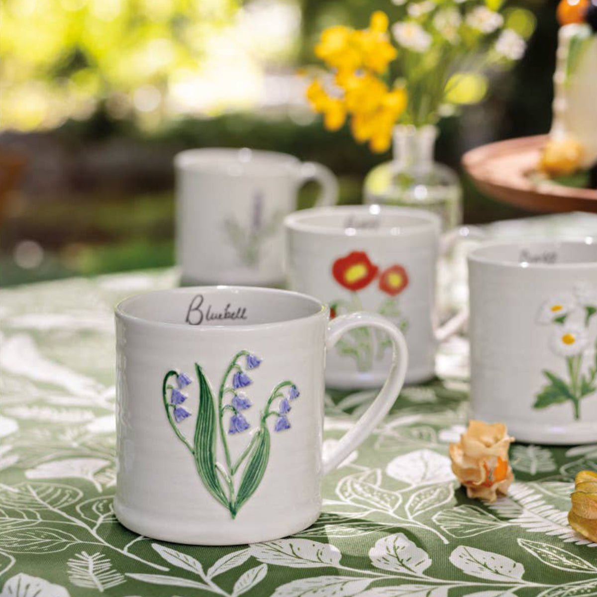 Danica Studio Bluebell Embossed Mug in a styled setting — stoneware