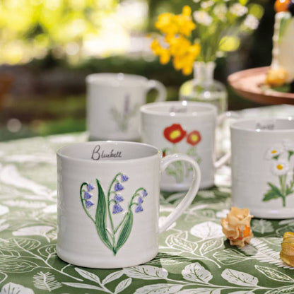 Danica Studio Bluebell Embossed Mug in a styled setting — stoneware