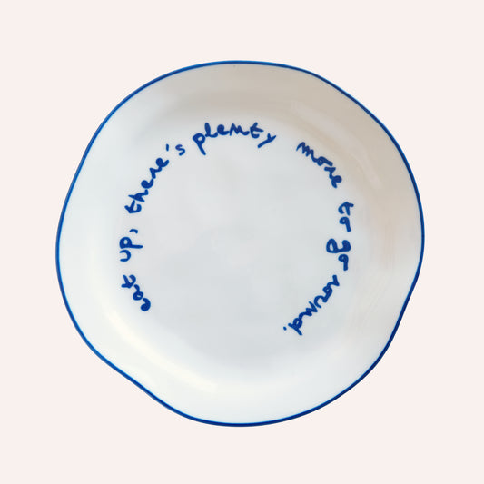 
Maegen blue statement lunch plate with t=the slogan eat up there's plenty more to go around