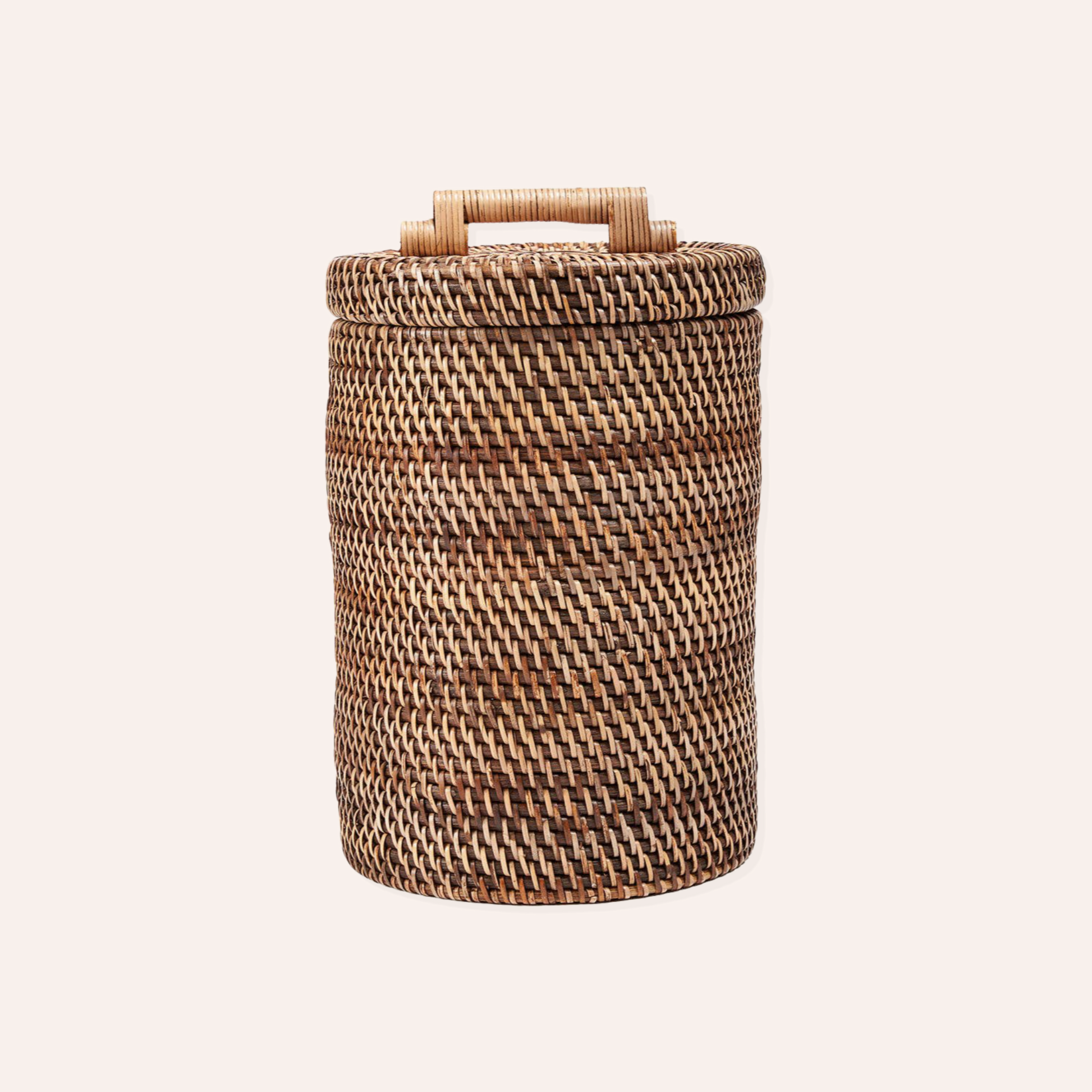 A cylindrical woven basket with a lid and a small loop handle, shown against a plain off-white background.